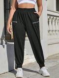 Pantaloni sportivi tasca con zip laterale con vita elastica