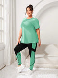 Set sportivo casual da donna taglia comoda, composto da Maglietta a maniche raglan a girocollo monocromatica e leggings a blocchi di colore, adatto per l'allenamento
