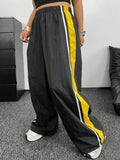 Pantaloni della tuta casual oversize da donna in stile urban, con patchwork e righe, con laccio in vita